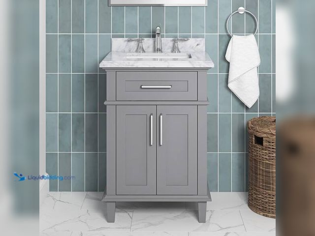 Lot 49-5542708 - Home Decorators Collection
Sonoma 24 in. Single Sink Freestanding Pebble Gray Bath Vanity with Carr...