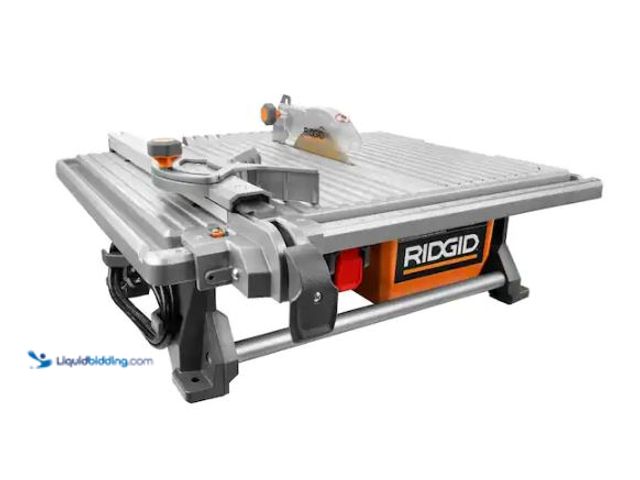 Lot 49-1627575 - RIDGID 6.5-Amp 7 in. Blade Corded Table Top Wet Tile Saw Model # R4021, Used, Has Attachments, Unabl...