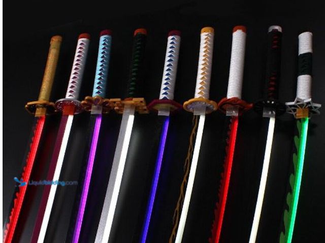 Lot 49-3473694 - Lot of (2) Zisu LED Glowing Anime Cosplay Sword Zenitsu Sword - 40 Inch Rechargeable Light Up Sword ...