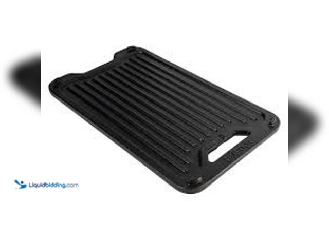 Lot 49-5485659 - Traeger ModiFIRE Reversible Cast Iron Griddle. Model # BAC609. Unused with scuffs and scratches pres...