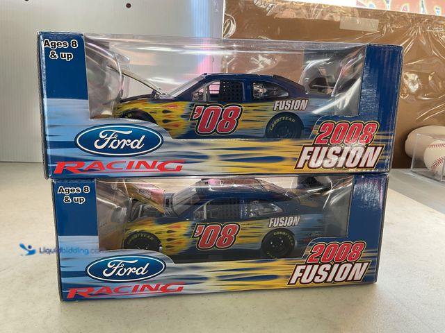 Lot 49-1505054 - COLLECTIBLE LOT OF 2 FORD RACING 2008 FUSION 1/24 SCALE DIECAST CARS IN ORIGINAL BOXES