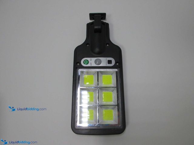 Lot 49-5388234 - Outdoor Solar LED Wall Light with Motion Sensor and Remote - NEW - 8.9" x 3.3"&nbsp; Featuring 3 Lig...