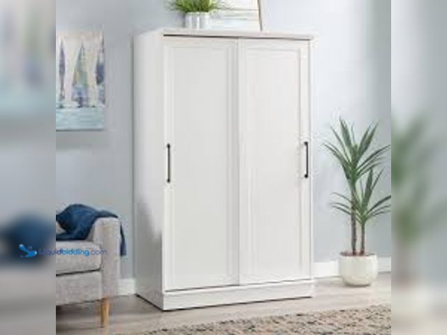 Lot 49-5471779 - SAUDER HomePlus White Finish 64 in. Storage Cabinet with Adjustable Shelves. Model # 442790. Unused