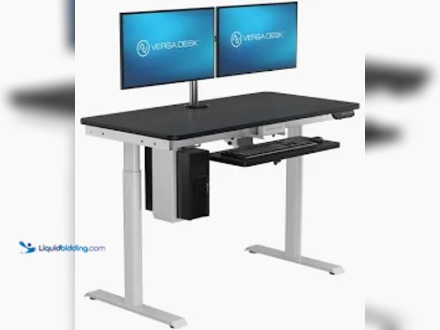 Lot 49-3563428 - bestar upstand 61 cm x 122 cm (24 in. x 48 in.) height adjustable desk with dual monitor arm. Model ...