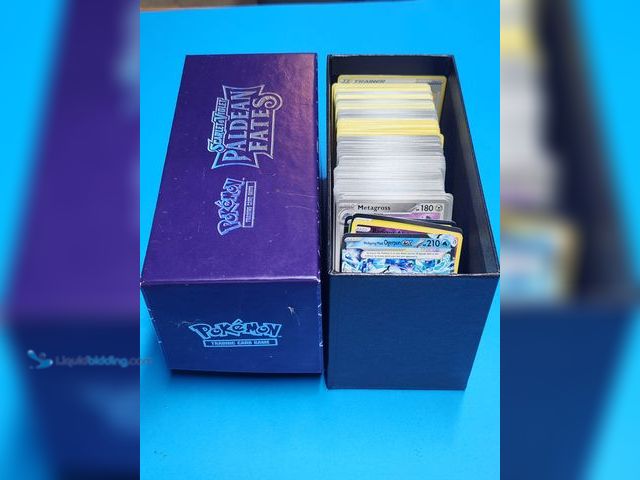 Lot 49-1988929 - BOX OF 300+ COLLECTIBLE POKEMON GAMING CARDS.