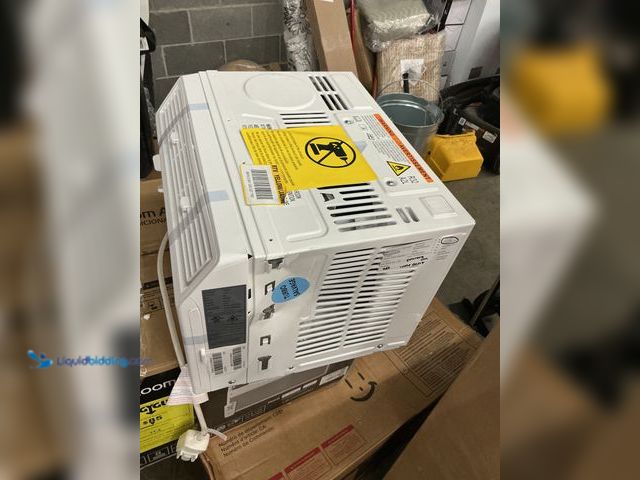 Lot 49-5549988 - 5,000 BTU Window Air Conditioner . Model: HAC5. Used, front dented, no remote