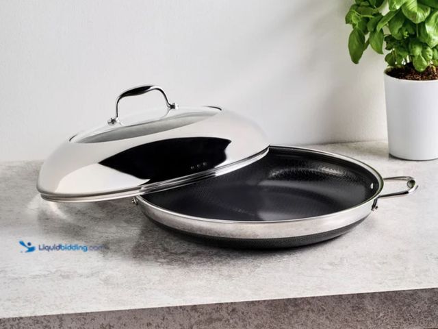 Lot 49-2001346 - HexClad Hybrid 14" Pan with Lid, Dishwasher-friendly, Model # 859006007496, Unused, Has attachments....