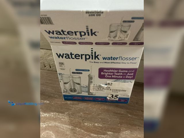 Lot 49-5484673 - Waterpik Ultra Plus and Cordless Pearl Water Flosser Combo Pack Unused