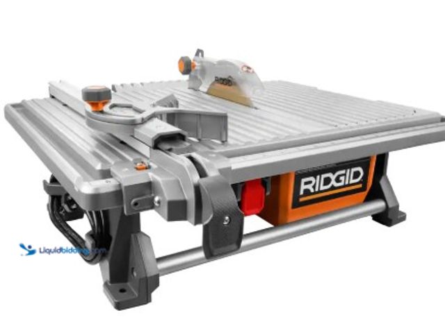 Lot 49-1516478 - RIDGID 6.5-Amp 7 in. Blade Corded Table Top Wet Tile Saw, model # R4021, new.  Ref#HD-0725