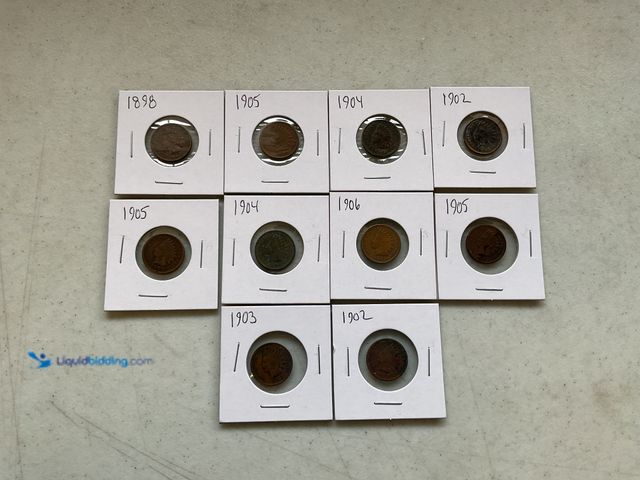 Lot 49-1811346 - 10 INDIAN HEAD PENNIES FROM THE EARLY 1900’S