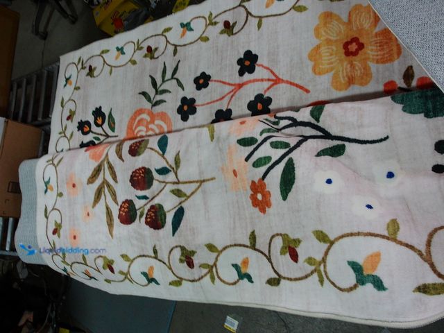Lot 49-1551289 - 8" x 10" Multi colored Floral Area Rug, Slightly used.  Ref#CRS1110