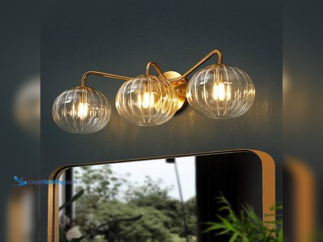 Lot 49-3565011 - LNC Modern 23.6 in. 3-Light Plated Brass Vanity Light with Pumpkin Clear Glass Shades for Bathroom V...
