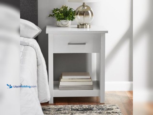 Lot 49-2025449 - Mainstays Hillside 1-Drawer Nightstand with Open Storage, White Finish, Model # 210537303, MSRP $62,...