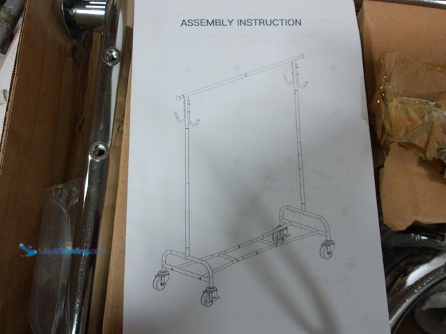 Lot 49-1555637 - Garment Rack with Bottom Storage, Silver, Unused.  Ref#BULK1126