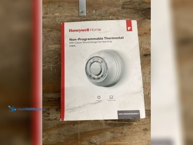 Lot 49-5448333 - Honeywell Home Round Non-Programmable Thermostat with 1H Single Stage Heating, Manual Control, Low V...