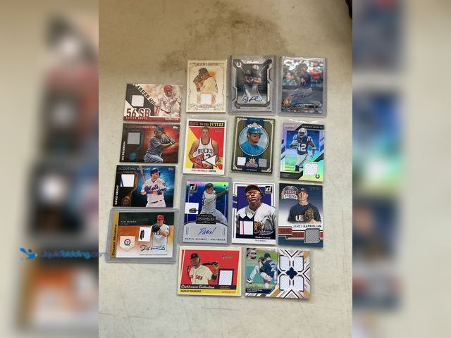 Lot 49-1811337 - COLLECTIBLE 15 GAME USED, JERSEY, PATCH, AUTOGRAPHED AND NUMBERED SPORT CARDS VARIOUS STARS