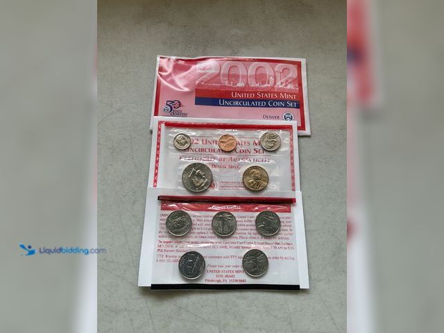 Lot 49-5451687 - 2002 UNITED STATES MINT UNCIRCULATED COIN SET 10 COINS IN PLASTIC SLEEVES AND ORIGINAL ENVELOPE