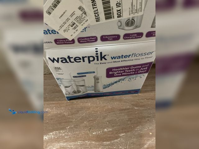 Lot 49-5484674 - Waterpik Ultra Plus and Cordless Pearl Water Flosser Combo Pack Unused