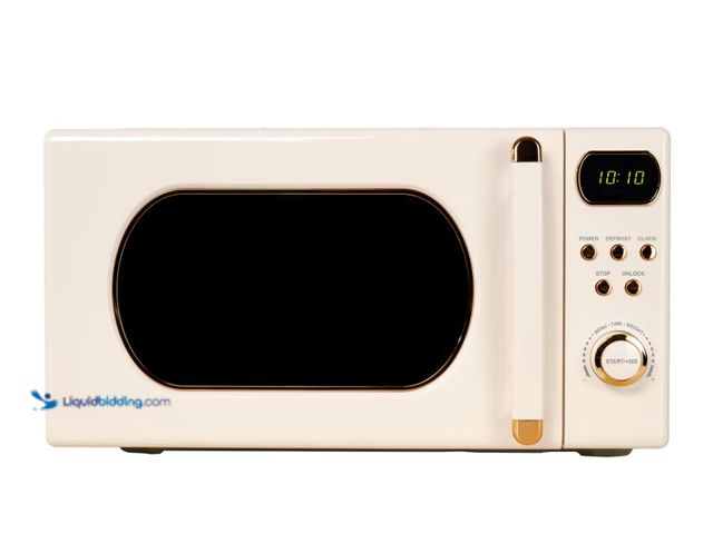 Lot 49-5543023 - Mainstays 0.7 Cu ft Retro Countertop Microwave Oven , 700 Watts, Vanilla Dream, Unused. Powers on.
