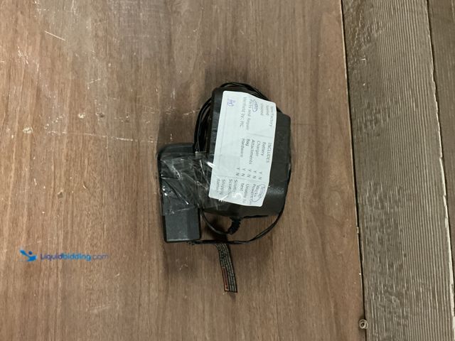 Lot 49-5445986 - ryobi 18v battery charger, Model#P1188, Used.