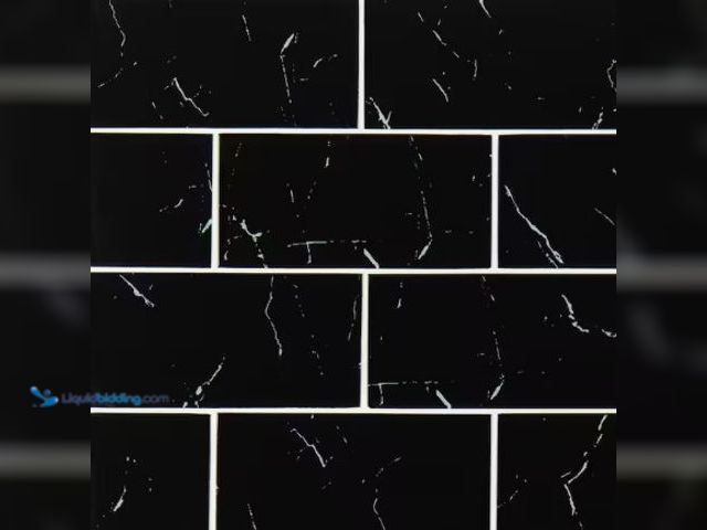 Lot 49-3631121 - APPROX. (10) SQ FT of MSI Nero Marquina 3 in. x 6 in. Glass Subway Wall Tile, Model # GL-T-NERMAR36,...