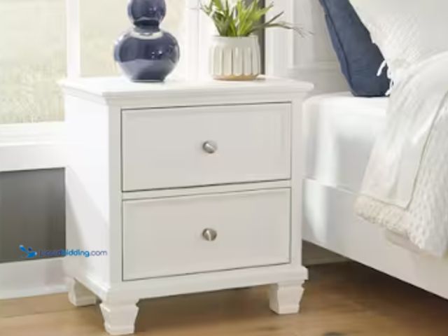 Lot 49-1636784 - Signature Design by Ashley Fortman White 2-Drawer Night Stand End Table, 25" Width, Model # B680-92,...