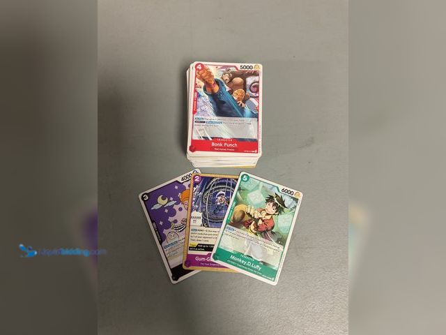 Lot 49-1505384 - COLLECTIBLE AMAZING LOT OF 100+ COMMON ONE PEICE CARDS FROM VARIOUS YEARS AND TYPES. AWESOME LOT FOR...