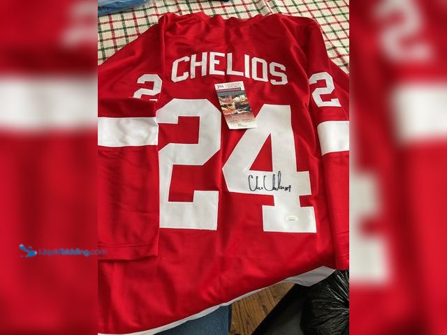 Lot 49-1505910 - COLLECTIBLE AWESOME DETROIT RED WINGS CHELIOS AUTOGRAPHED STITCHED HOCKEY JERSEY WITH JSA COA #COINS...