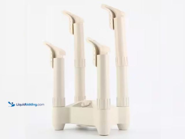 Lot 49-3473661 - Lot of (2) WeWarm 4 Post-Fast Air Boot and Glove Dryer, Model # BD001, New, 2 Dryers.  Ref#LBRELIST