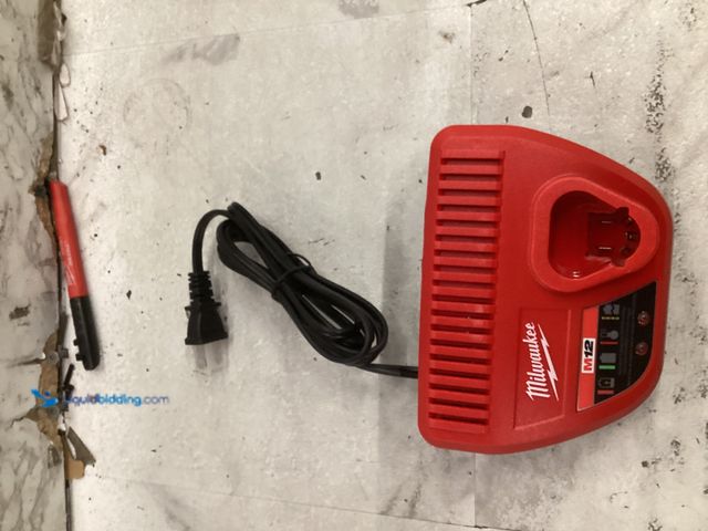 Lot 49-5555475 - Milwaukee M12 Single Bay Battery Charger, Unused, Works