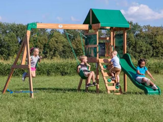 Lot 49-1549455 - Backyard Discovery Buckley Hill Outdoor Playground Set w/ Elevated Clubhouse, Rockwall, Ladder, Swin...