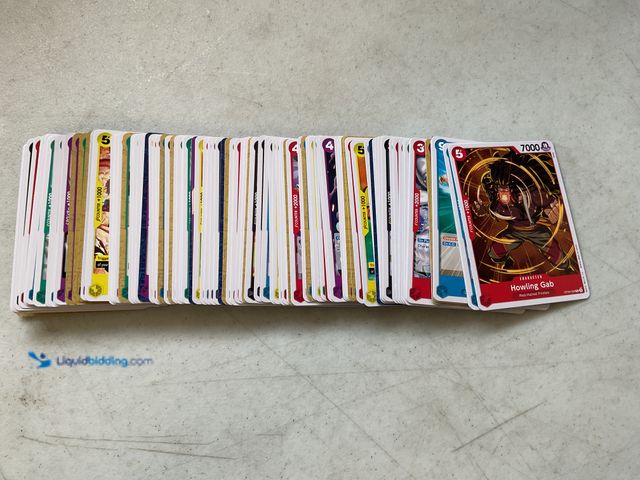 Lot 49-1830511 - COLLECTIBLE AWESOME STACK OF 100+ ONE PIECE COLLECTIBLE TRADING CARDS VARIOUS YEARS AND TYPES LOADED...
