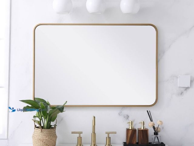 Lot 49-2025299 - Elegant Decor Evermore 24 x 36 inch Soft Corner Metal Rectangular Mirror in Brass, Model # MR802436B...