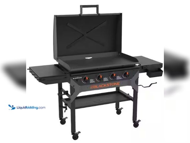 Lot 49-2022742 - Blackstone 4-Burner Liquid Propane Outdoor Griddle with Hood in Black, Model # 8093917, MSRP $528.22...