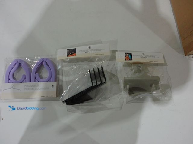 Lot 49-2001397 - Lot of approx. (36) Assorted Travel Hangers, Different varieties, Includes Black Travel Hanger Hooks...