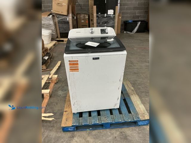 Lot 49-5485330 - Maytag Washer. Used. Scuffs. Dirty and dented.