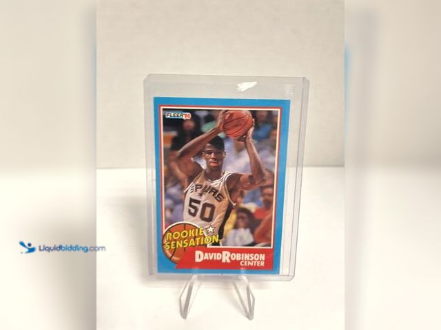 Lot 49-910517 - 1990 Fleer David Robinson Rookie Sensation Insert #1 of 10 – San Antonio Spurs Featuring Hall of Fam...