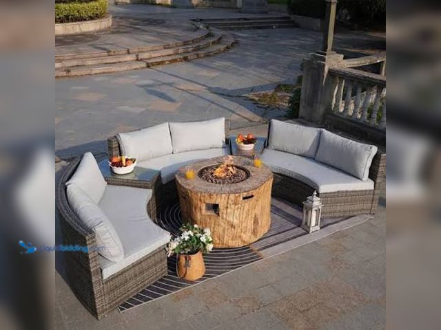 Lot 49-5580756 - Grey Wicker Curved Outdoor Sofa With Fire Pit. Missing Small Table and 2 Corner Seats. Model #nbcs09...