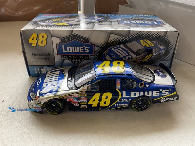 Lot 49-5350275 - ACTION RACING #48 JIMMIE JOHNSON LOWE’S 1/24 SCZLE DIECAST CAR IN ORIGINAL BOX