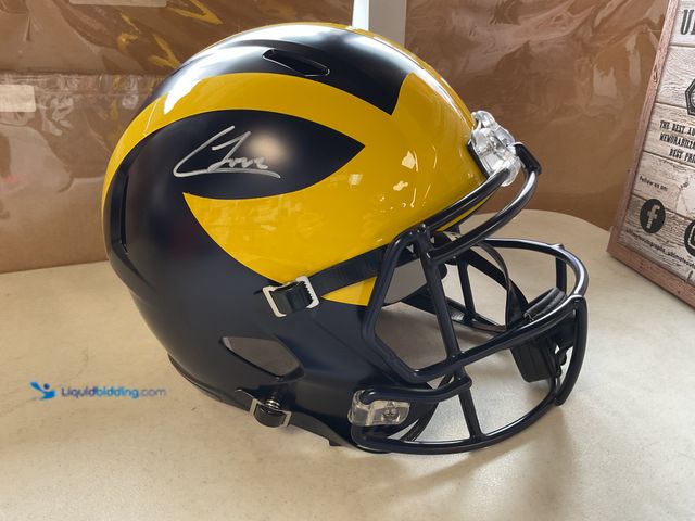 Lot 49-1810263 - COLLECTIBLE U OF M COLSTON LOVELAND AUTOGRAPHED FULL-SIZE REPLICA FOOTBALL HELMET