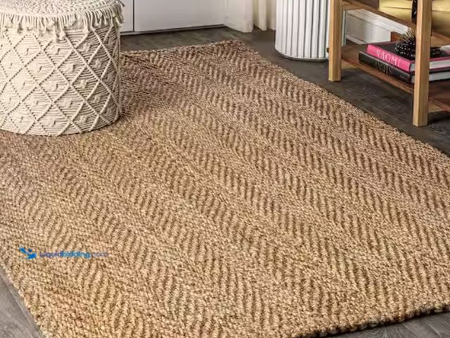 Lot 49-3614705 - JONATHAN Y Espina Natural Brown Hand Woven Herringbone Chunky Jute 3 ft. x 5 ft. Area Rug, Model # N...