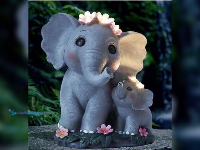 Lot 49-3520577 - Qty 2. Garden Decor Solar Garden Statues Elephant. Model #B0DT4CGL7J. Unused.