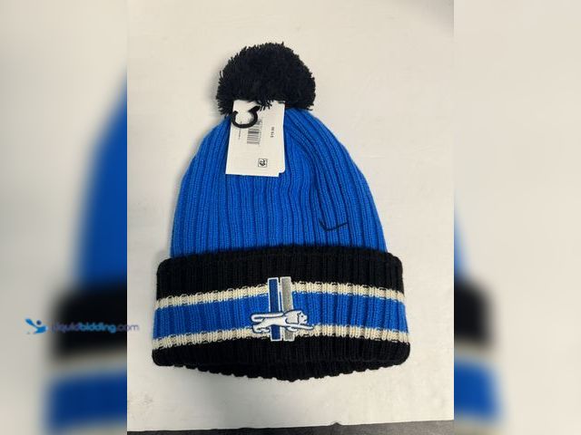 Lot 49-910398 - New With Tags Detroit Lions NFL Pom Beanie Hat – Blue & Black Winter Knit Cap. Stay warm while reppi...