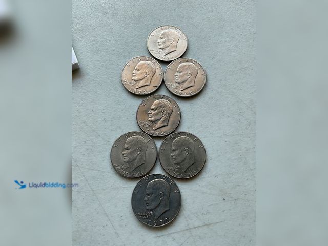 Lot 49-1804205 - 7 “IKE” EISENHOWER ONE DOLLAR COINS.
