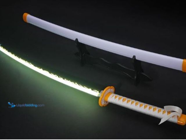 Lot 49-3473692 - Lot of (2) Zisu LED Glowing Anime Cosplay Sword Zenitsu Sword - 40 Inch Rechargeable Light Up Sword ...
