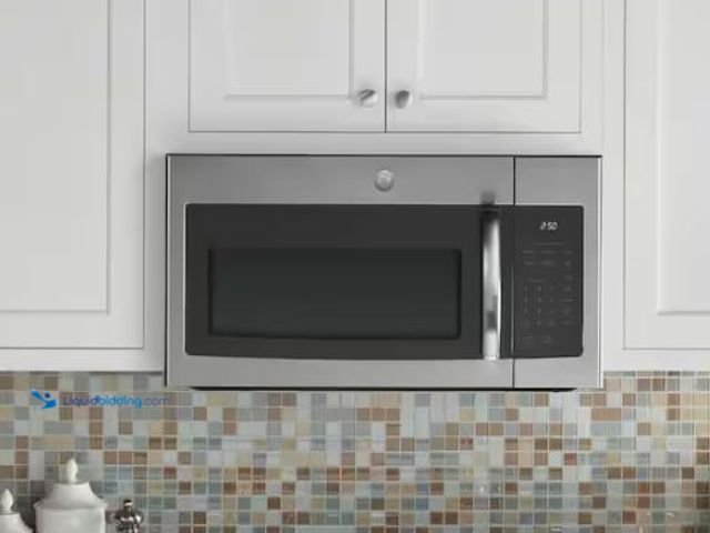 Lot 49-1549409 - GE 1.6 cu. ft. Over-the-Range Microwave in Stainless Steel, Model # JVM3160RFSS, Slightly used, Test...