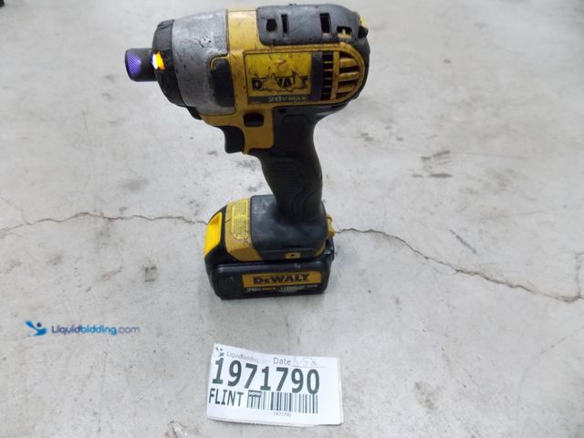 Lot 49-1971790 - 1 Dewalt DCF885 Battery Powered 20 Volt Drill And Grinder Dewalt 20 Volt 1/4" Impact Driver Used In ...
