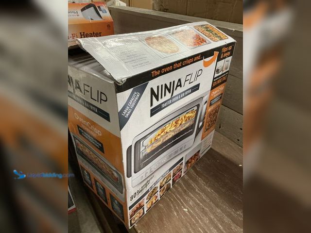 Lot 49-5477899 - Ninja Flip Toaster Oven & Air Fryer (crumbs inside) (scuffs and scratches) (powers on) Used