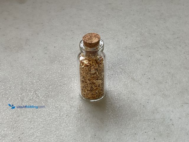 Lot 49-3503783 - RARE ONE INCH GLASS VILE OF 24K GOLD FLAKES