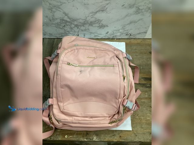 Lot 49-5415148 - Lovevook Backpack laptop case. Slightly used.